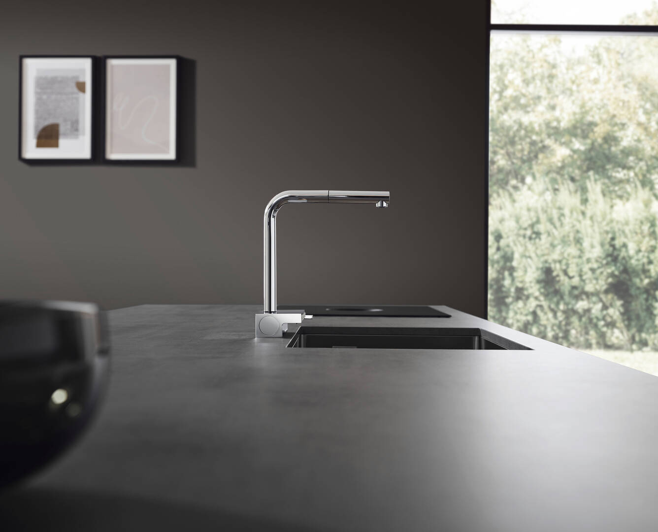 Family in a bathroom with matte black surfaces.