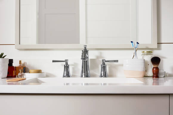 Bathroom with two handle chrome faucet