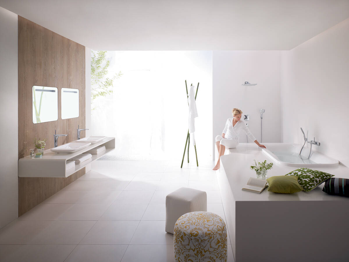 Comfy bathroom with natural ambience and elegant fixtures. Comfy bathroom with natural ambience and elegant fixtures.