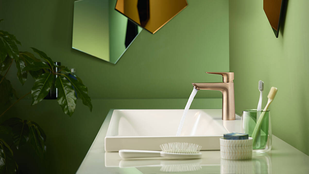 Gold basin tap matched with black.