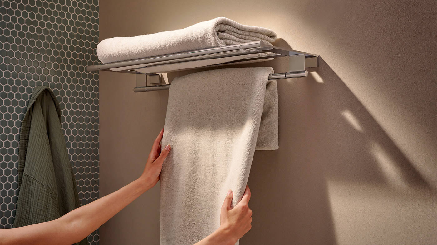 AddStoris S rack with integrated towel holder.