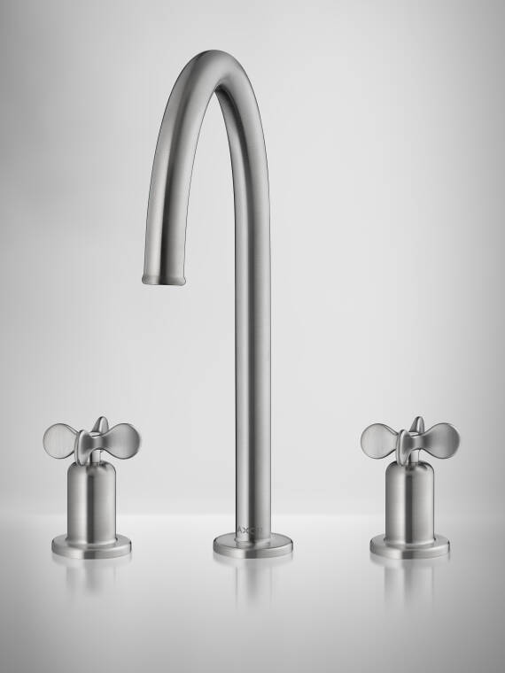 An AXOR Archivio three-hole basin mixer with signature cross handles.