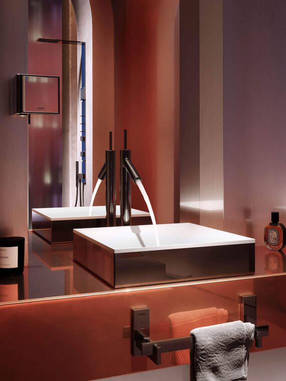 Detail of AXOR Suite washbasin, and AXOR Starck faucet in Polished Black Chrome finish. Detail of AXOR Suite washbasin, and AXOR Starck faucet in Polished Black Chrome finish.