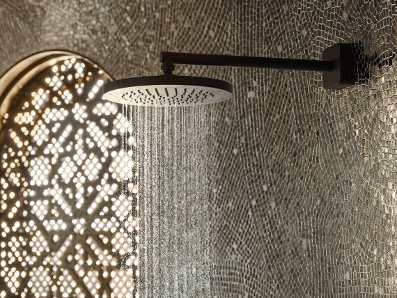 Illustration of a luxurious bathroom with tiles and AXOR ShowerSolutions overhead shower in Matt Black