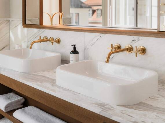 The Brushed Gold optic contrasts perfectly with a setting of marble and oakwood. The Brushed Gold optic contrasts perfectly with a setting of marble and oakwood.