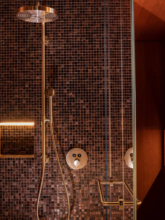 Detail of the AXOR One Showerpipe in Brushed Bronze Detail of the AXOR One Showerpipe in Brushed Bronze