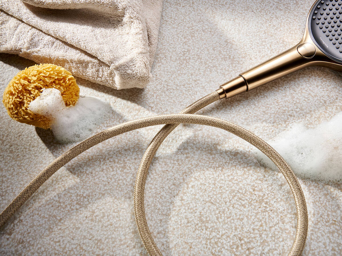 Flexo de ducha Designflex con tacto textil.