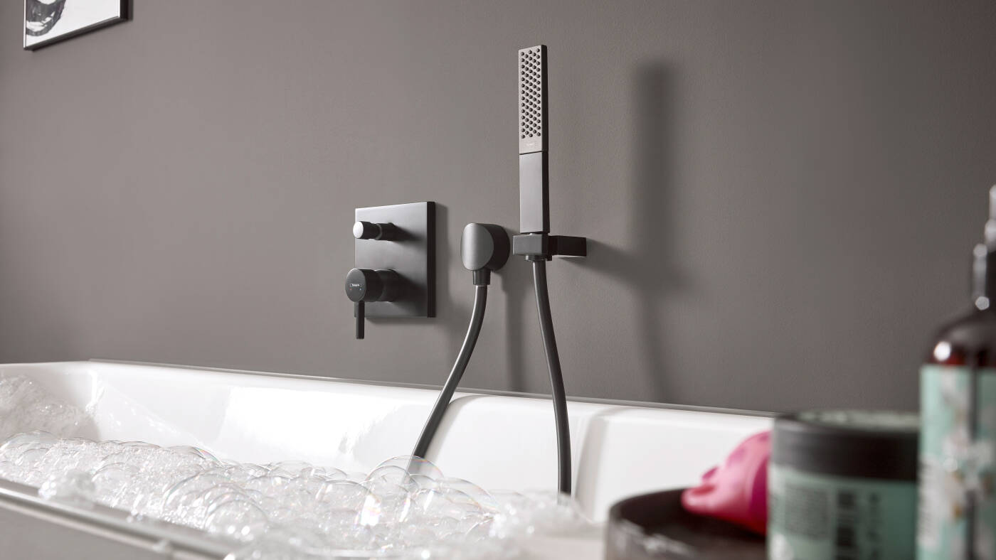 Matte black, concealed installation bath tub faucet by hansgrohe.