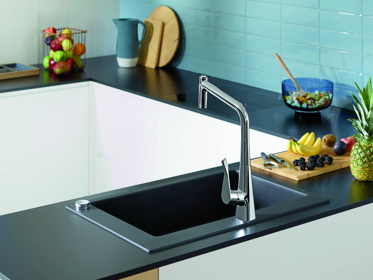 2-hole tap with the Select push button on the rim of the sink.