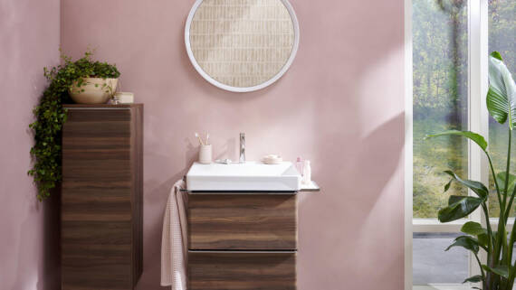 Pink bathroom with plants.