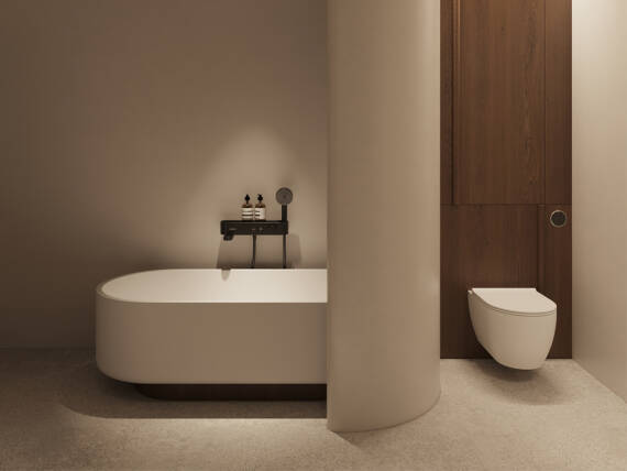 Modernes hansgrohe Badezimmer mit minimalistischem Wannen- und Toilettenbereich.