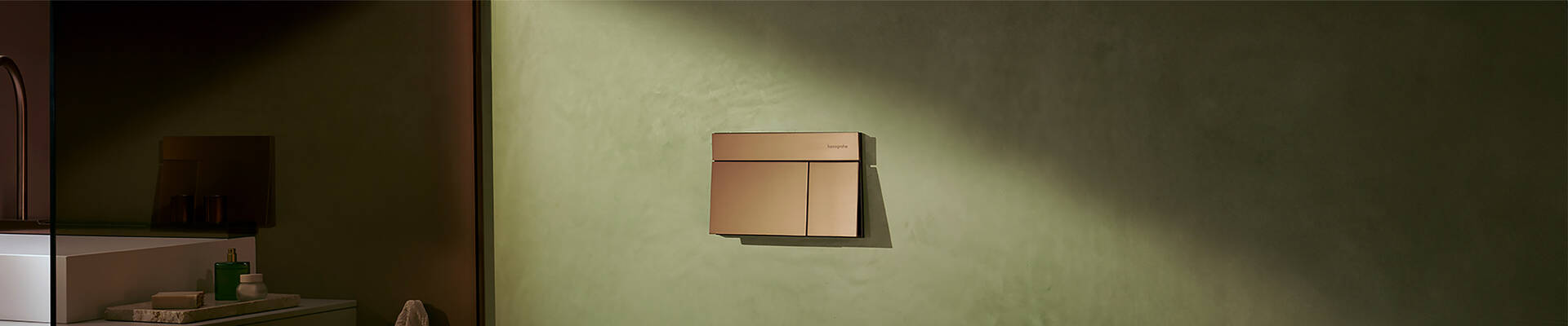 Splachovacie tlačidlo iFrame pre toaletu s povrchovou úpravou Brushed Bronze.