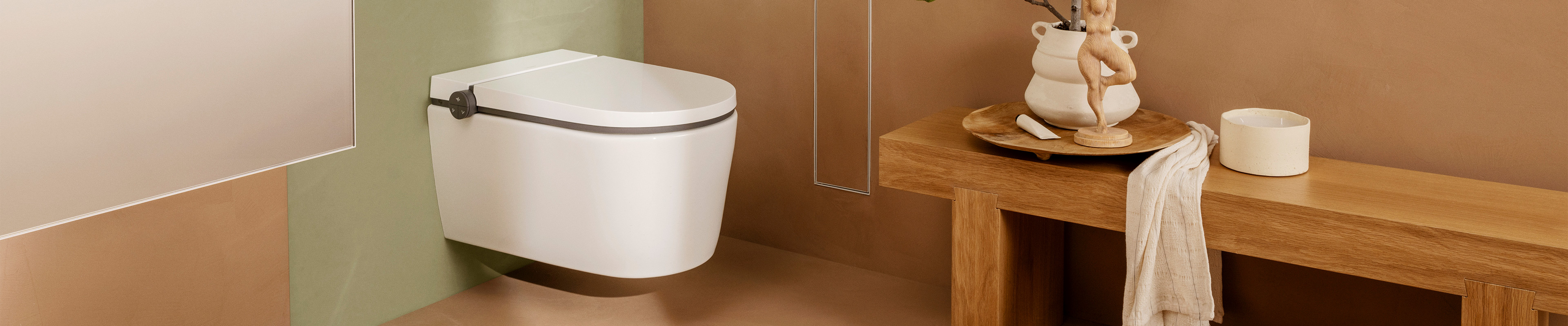 A wall-mounted hansgrohe bidet toilet.