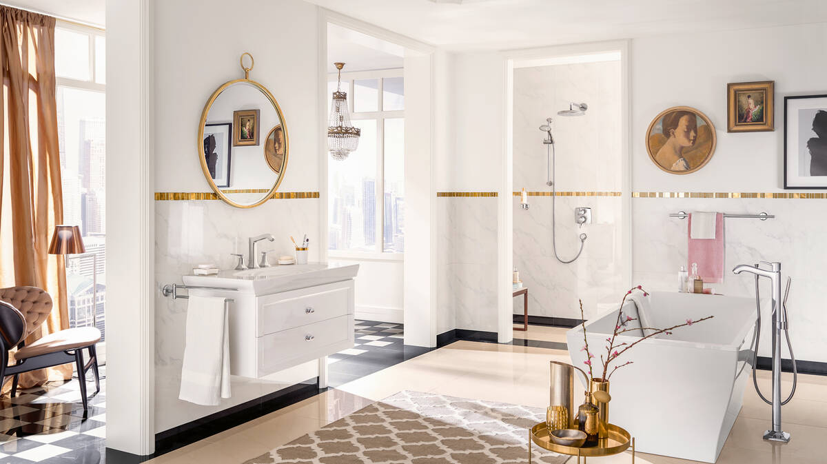 Classically designed bathroom with freestanding tub.