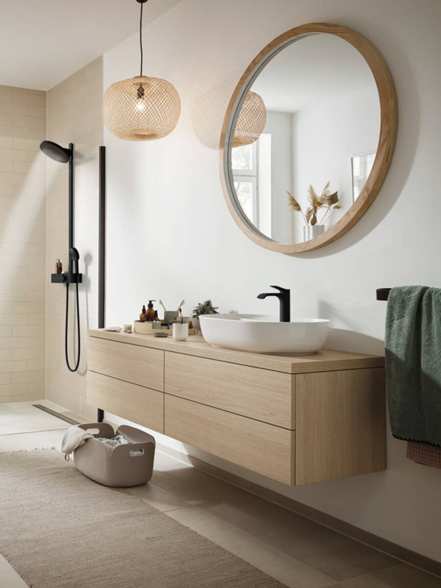 Vivenis tap matched with a wooden wash basin unit.