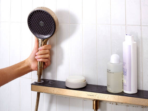 Rainfinity wall connection with shower support and shower shelf.