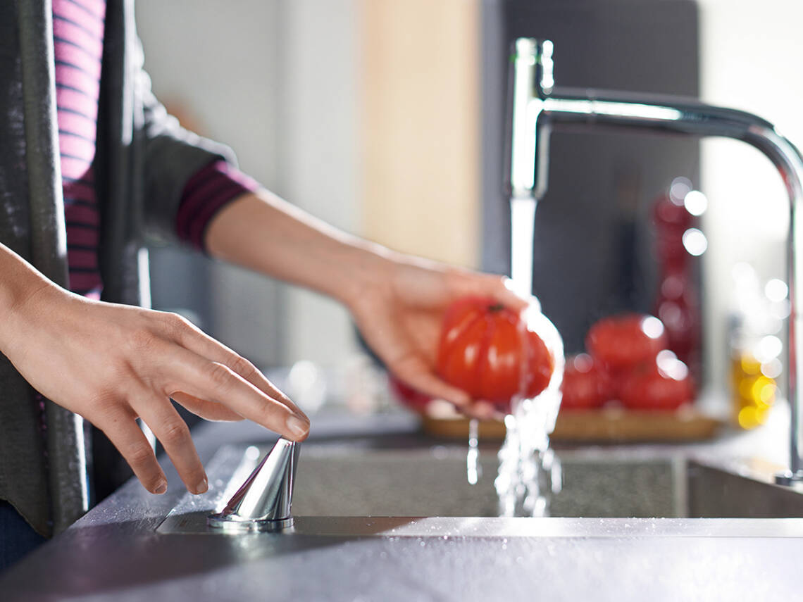 hansgrohe kitchen tap, operated using the Select push button.