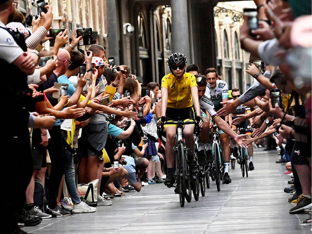BORA-hansgrohe cycling team and enthralled spectators.