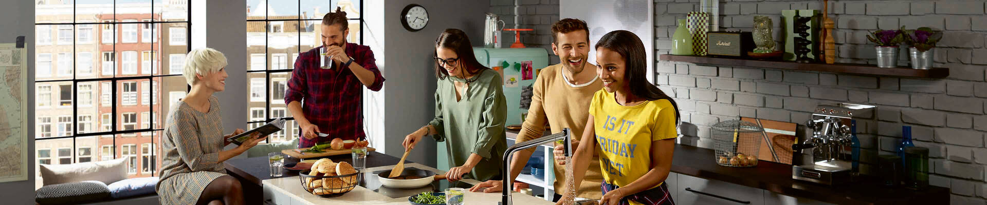 Generous kitchen with family and guests. Generous kitchen with family and guests.