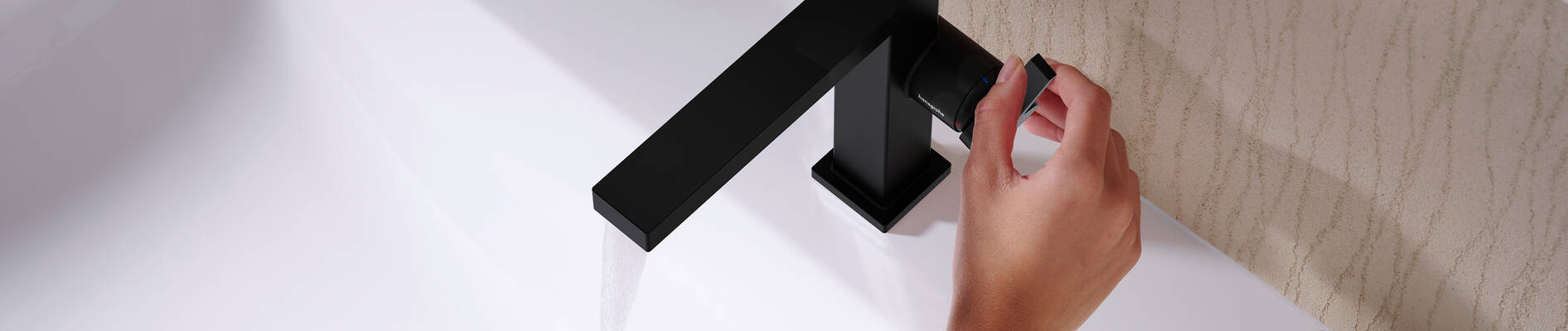 Matte Black lavatory faucet by hansgrohe.