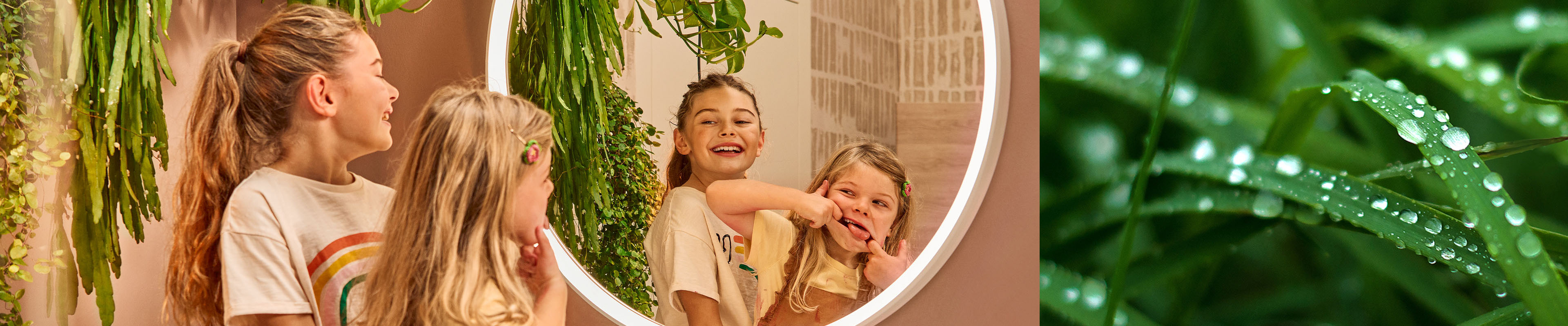 Man showering with EcoSmart overhead shower made by hansgrohe.