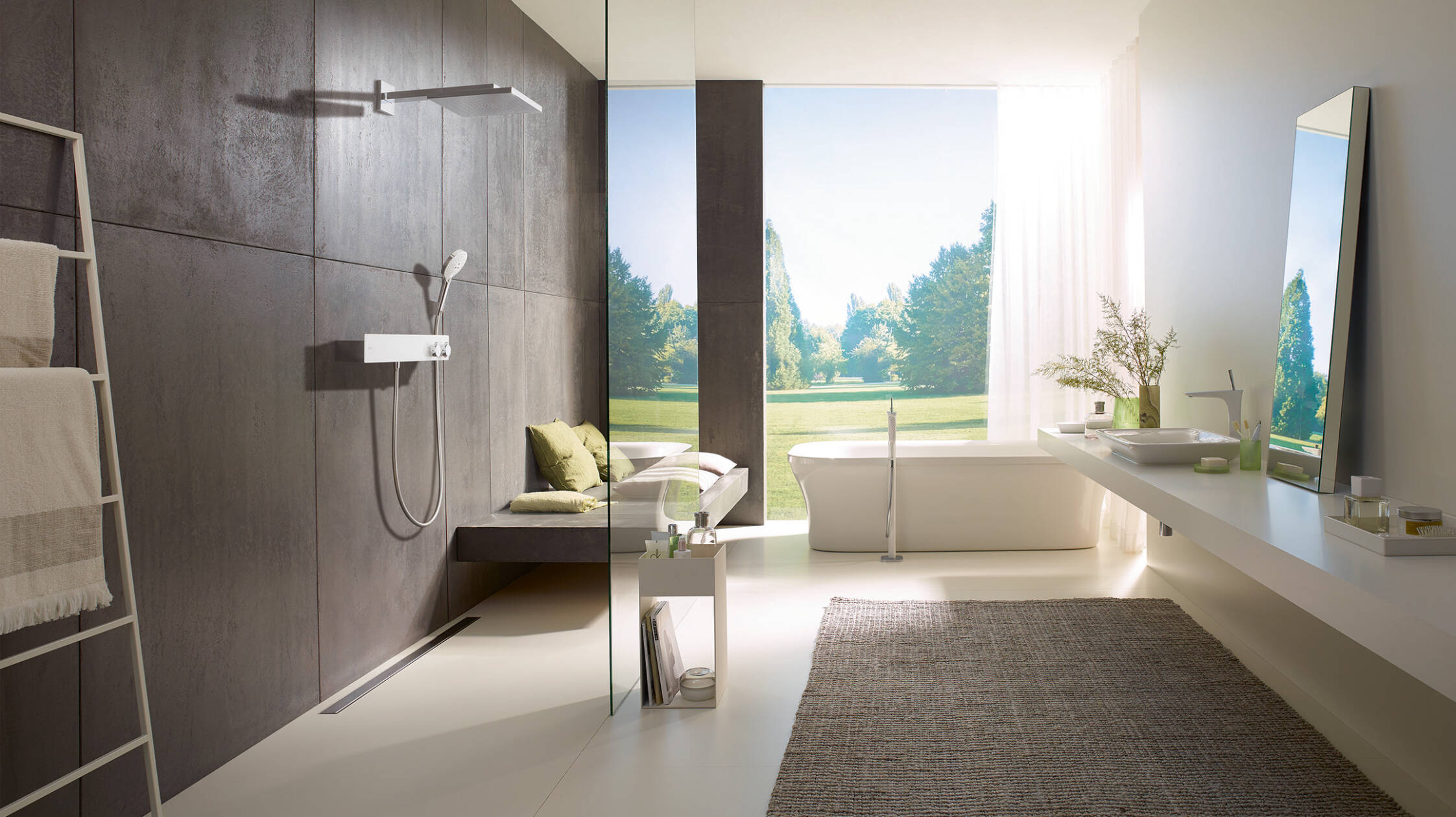 Bathroom in minimalist style with wide window's looking out into the garden.