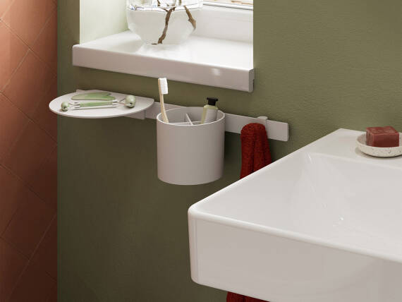Matt White WallStoris accessories next to the wash basin.