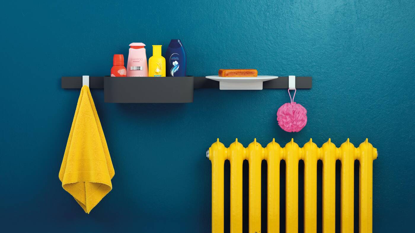 汉斯格雅的 WallStoris：彩色浴室中的黑色墙上支架。