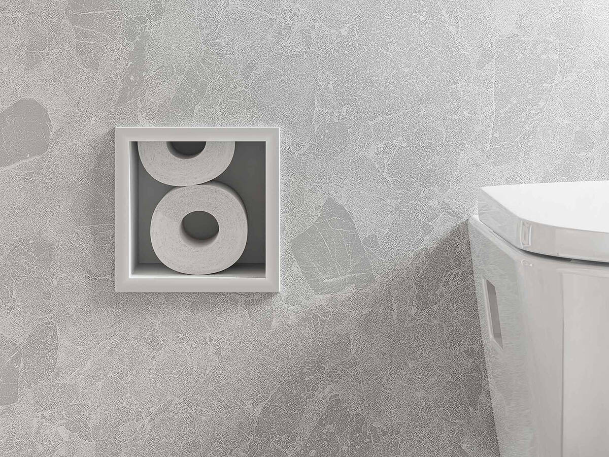 Stylish, white hansgrohe alcove with toilet paper.