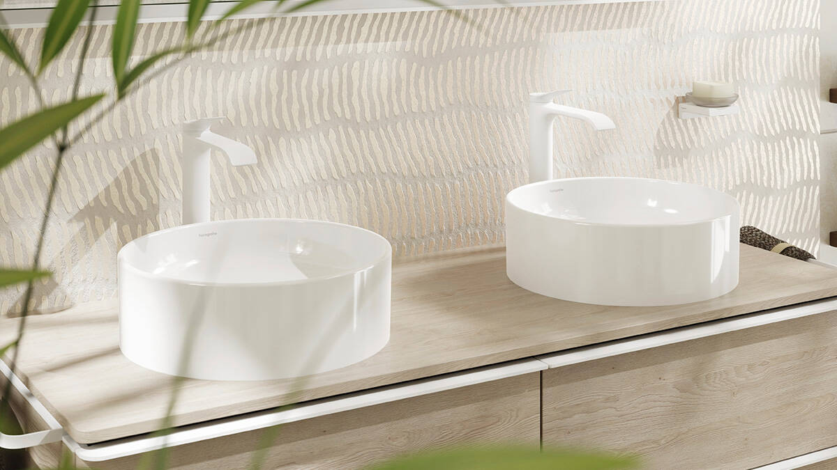 Xuniva countertop wash bowl surrounded by Xelu Q bathroom furniture.