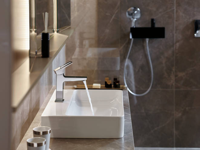 Close-up: Single lever basin mixer 110 with loop handle and push-open waste 1